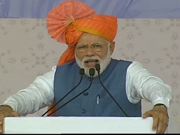 Prime Minister Narendra Modi addressing a rally in Ahemdabad, Gujrat on Tuesday. (Photo/ANI)