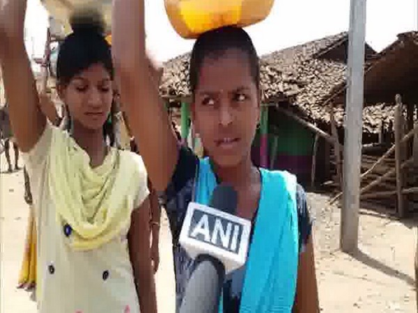 Young girls often miss out on school or college to fetch water for their families in Betul, MP. [Photo/ANI]