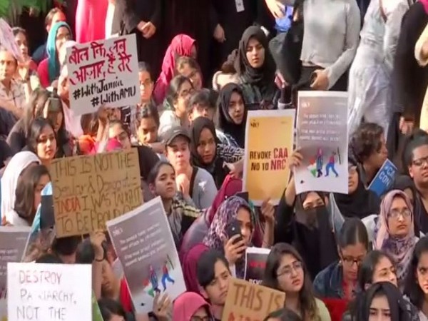 Protestors with banners in hands during the protest in Pune on Tuesday (Photo/ANI)
