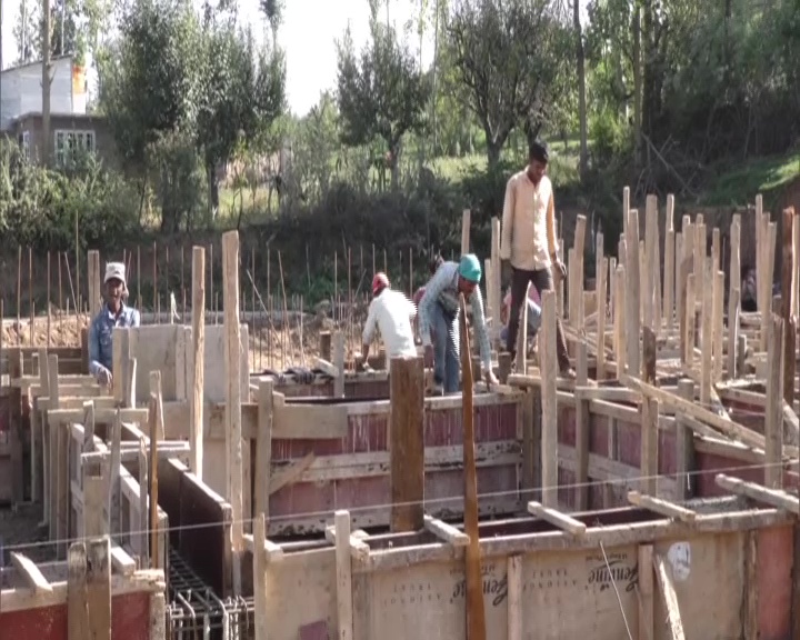 Construction of the indoor stadium in Kupwara district's Handwara is underway. (Photo/ANI)