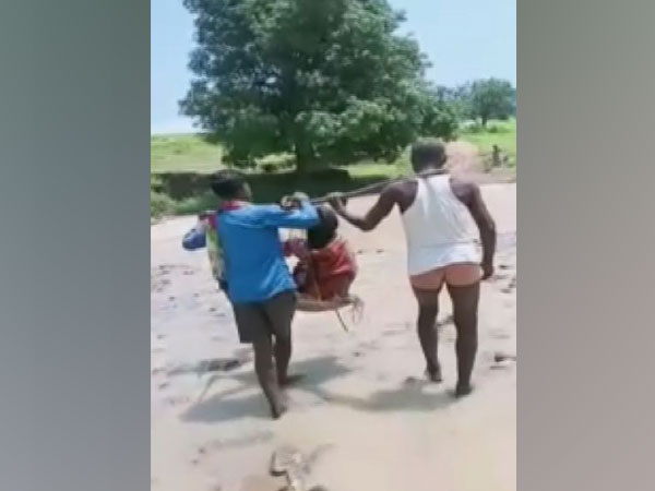 Pregnant woman carried on a makeshift basket in Chhattisgarh's Surguja (Photo/ANI)