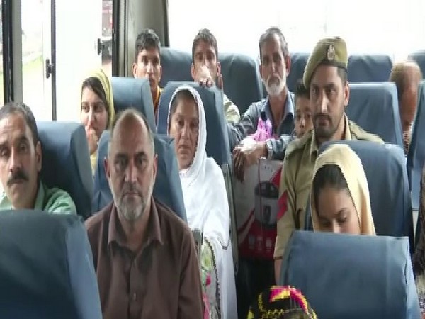 As many as 40 Pakistan occupied Kashmir (PoK) residents crossed border through Cross-LoC bus service. (Photo/ANI)