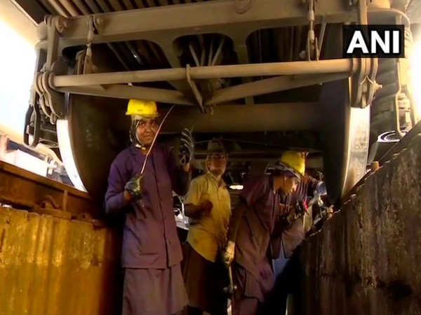 An all-women team looking after the maintenance of a train at Thiruvananthapuram Central Railway Station (Photo/ANI)