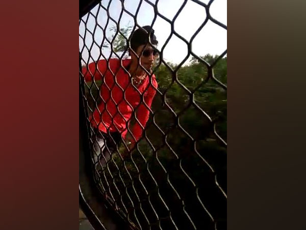 A visual of the video while Dilshan was attempting stunts on a local train (Photo/ANI)
