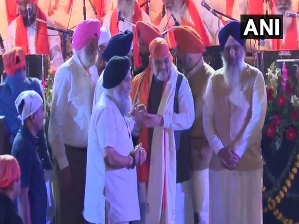 Union Home Minister Amit Shah at the 'Shabad Annahad Kirtan' organised by Delhi Sikh Gurdwara Management Committee (DSGMC), at the India Gate lawn. (Photo/ANI)