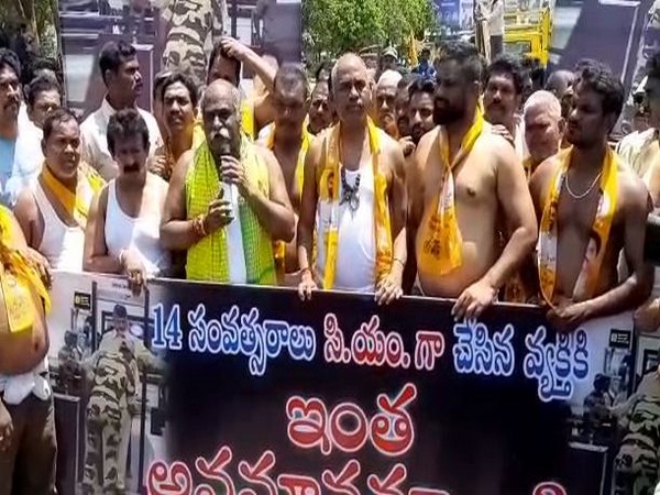 Two Telugu Desan Party (TDP) MLAs, along with other party workers at Visakhapatnam on Saturday. Photo/ANI