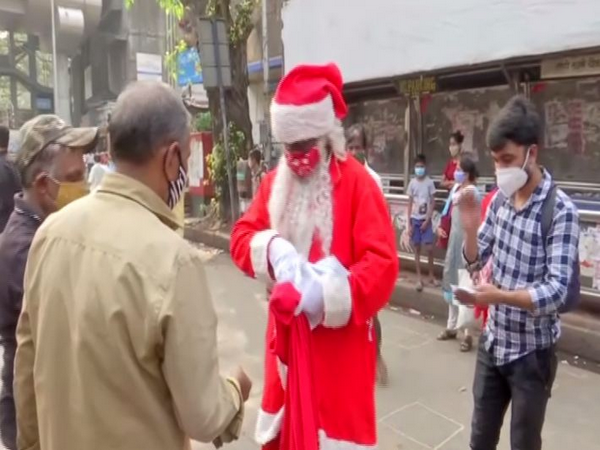 Ashok Kurmi dressed up as Santa Claus (Photo/ANI)
