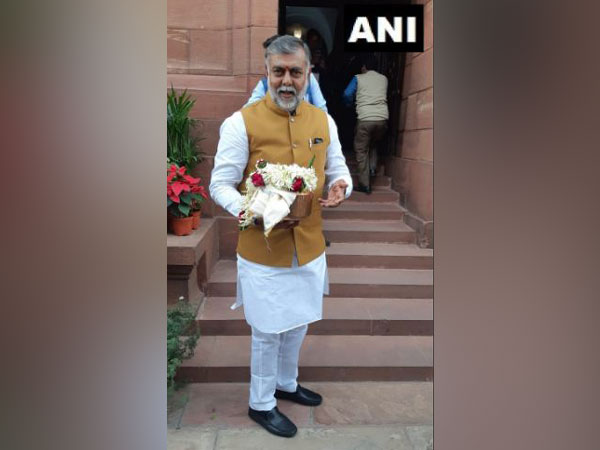 Union Minister Prahlad Singh Patel arrives at the parliament with an urn containing soil of Jallianwala Bagh on Thursday. Photo/ANI