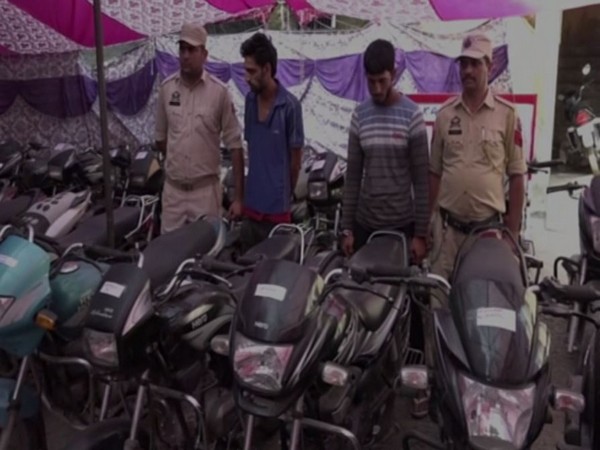 Police with accused -- Rehmat Ali and Ravinder Saini. in Kathua on Monday. Photo/ANI