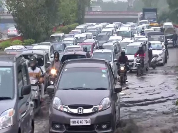 Visuals of heavy traffic due to waterlogging at Dhaula Kuan in New Delhi on Friday morning. Photo/ANI