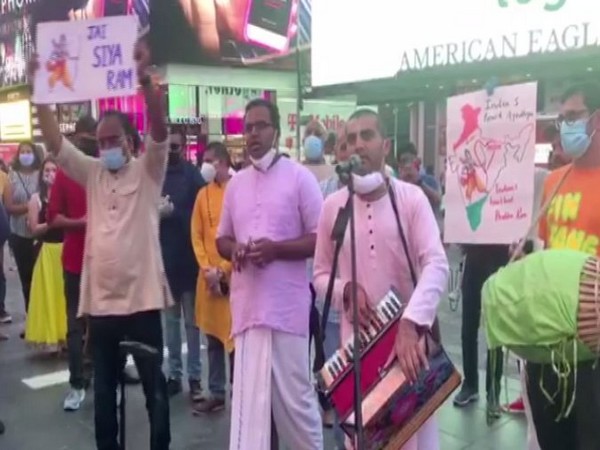People singing bhajans at New York's Times Square. (Photo/ANI)
