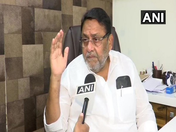 NCP leader Nawab Malik while speaking to ANI on Monday (Photo/ANI)