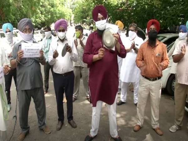 Transporters staging protest against hike in fuel prices in Delhi (Photo/ANI)