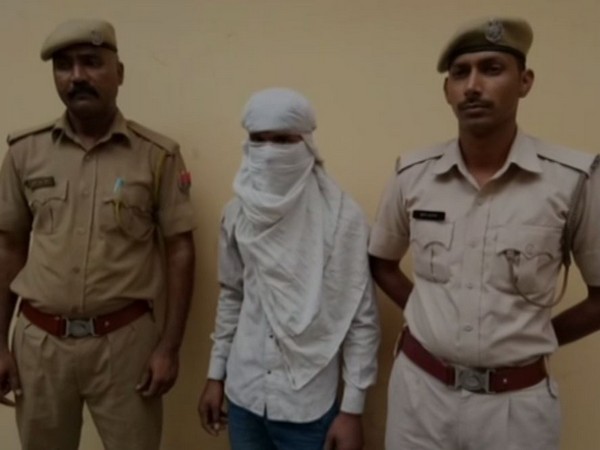 Rajasthan Police with the accused in Alwar on Thursday. Photo/ANI