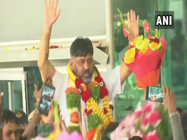 Thousands of supporters welcomed Congress leader DK Shivakumar at the Bengaluru airport on Saturday (Photo/ANI)
