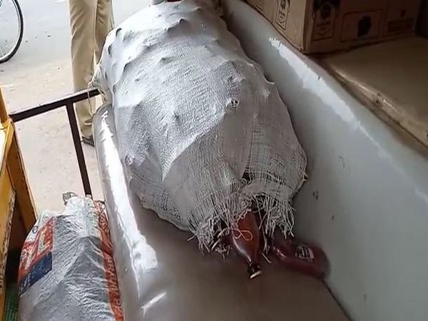 Veerulapadu Police has seized liquor bottles that were being transported illegally (Photo/ANI)