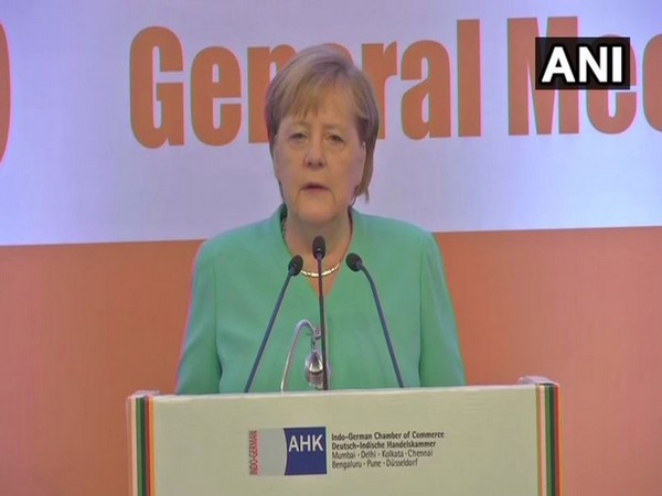 German Chancellor Angela Merkel addressing the gathering at a business meeting in New Delhi (Photo/ANI)