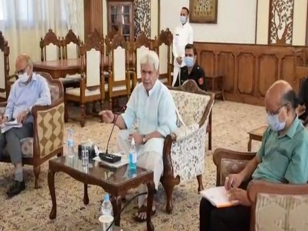 Lieutenant Governor of Jammu and Kashmir Manoj Sinha (middle)