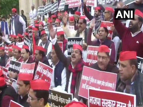 Samajwadi Party leaders while holding a protest in Lucknow on Thursday (Photo/ANI)