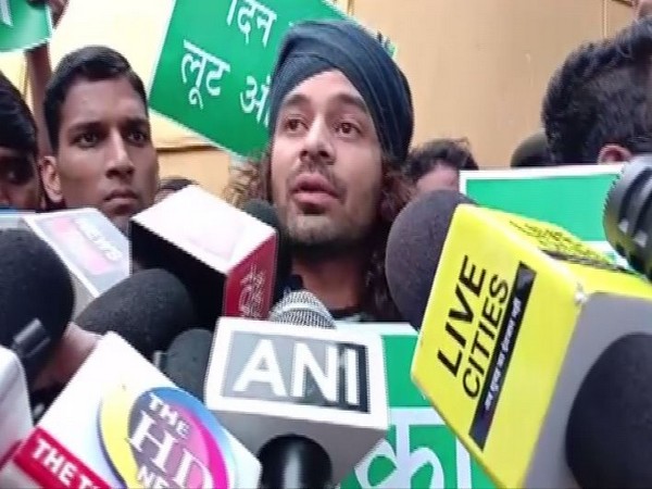 RJD leader Tej Pratap Yadav speaking to the media on Sunday.