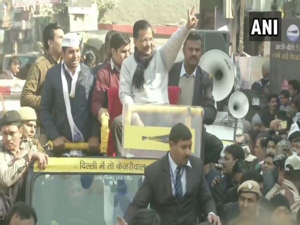 Chief Minister Arvind Kejriwal during a roadshow in Dwarka (Photo/ANI)