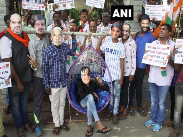 Congress workers stage protest against CM BS Yediyurappa in Bengaluru on Sunday. Photo/ANI