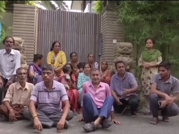 Kin of those killed in train tragedy on Dussehra last year staged a protest outside Punjab Congress MLA Navjot Singh Sidhu’s residence on Saturday. (Photo/ANI)
