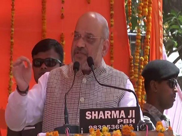 BJP president Amit Shah addresses an election rally in Pratapgarh on Monday. Photo/ANI