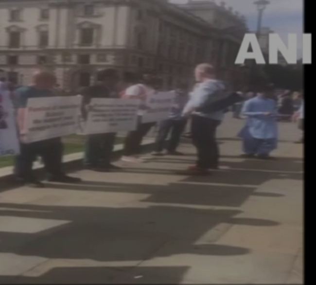 Free Balochistan Movement activists protesting outside British Parliament
