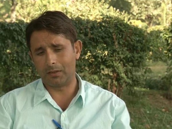 Javaid Masoodi, the floriculture officer at the Mughal Gardens in Srinagar. (Photo/ANI)