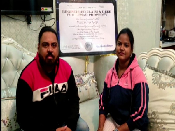 Dharmendra Anija and Sapna Anija with framed certificate of the property document (Photo/ANI)