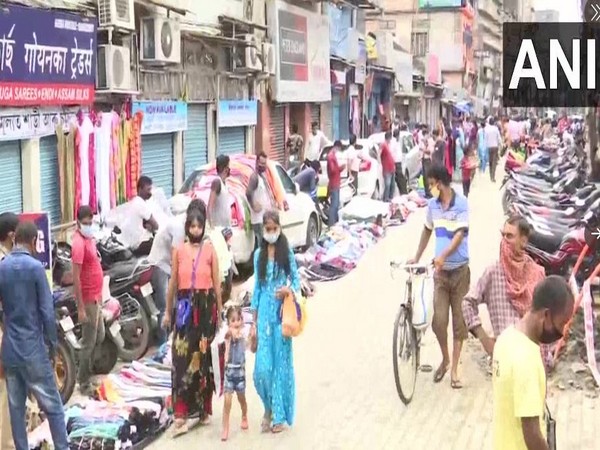 People shopping at a Guwahati market (Photo/ANI)