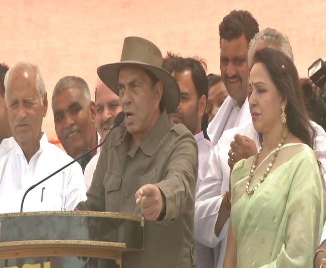 Dharmendra addressing a gathering in Mathura on Sunday. Photo/ANI