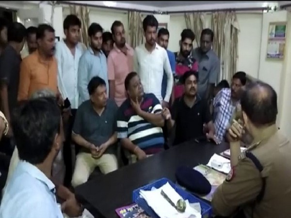 A verbal spat turned into physical altercation between a BJP member and police officer in Shamli (Photo/ANI)