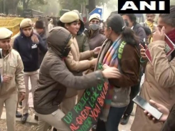 Police detains protesters outside Uttar Pradesh Bhawan in New Delhi on Friday (Photo/ANI)