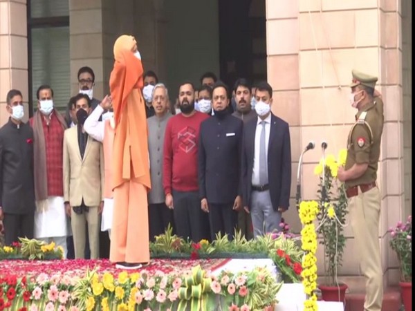 CM Yogi Adityanath unfurling the tricolour at his residence in Lucknow.