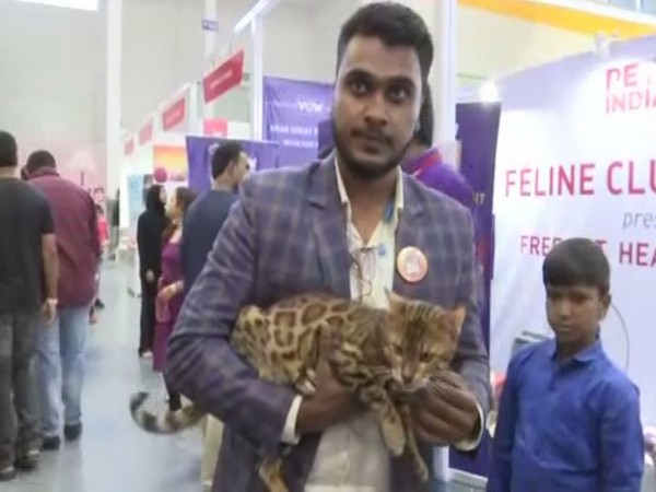 Mohammed Haroon along with his pet Bengal cat (Photo/ANI)
