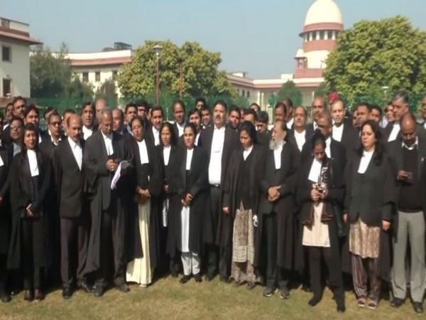 Supreme Court advocates singing the National Song in the court's law on Friday (Photo/ANI)