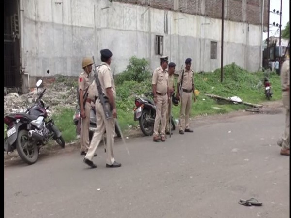 Police keeping a vigil in the Bamroli industrial area on Friday. Photo/ANI