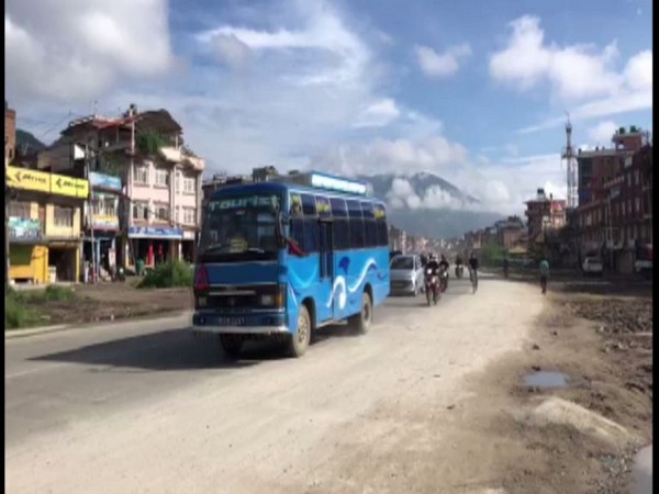 An early morning shot of a bus plying in Kathmandu. 
