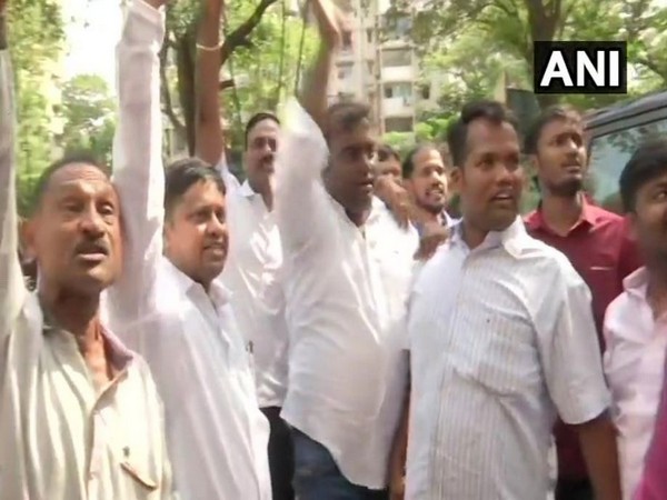 NCP workers raise slogans against Ajit Pawar in Mumbai on Saturday. Photo/ANI
