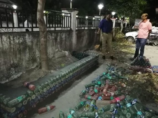 Uttarkashi DM, Dr Ashish Chauhan takes initiative to dispose of plastic bottles by constructing a model using empty bottles. (Photo/ANI)