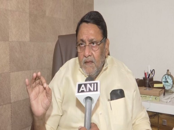 Nationalist Congress Party (NCP) spokesperson and minister Nawab Malik speaking to ANI on Thursday (Photo/ANI)