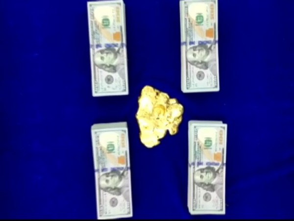 US Dollars and gold seized at the Chennai Airport (Photo/ANI)