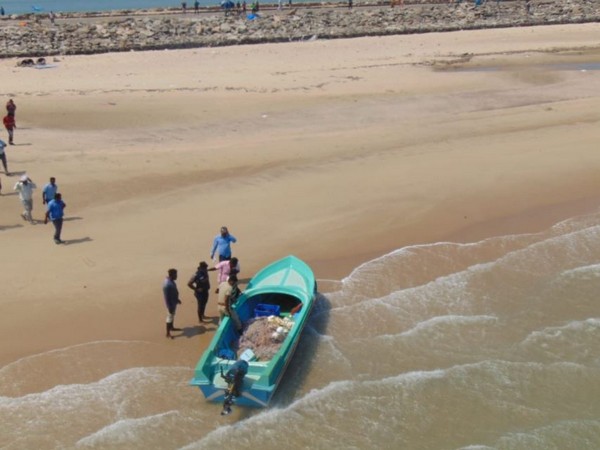 A Srilankan boat intercepted by Navy helicopter in Dhanushkodi (Photo/ANI)