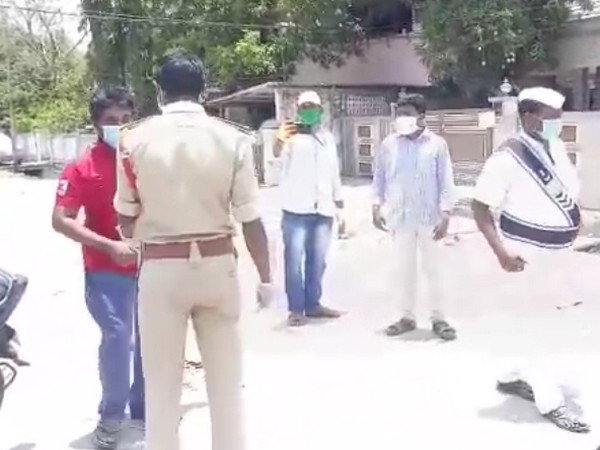 Police enquiring the lockdown violators in Krishna District (Photo/ANI)
