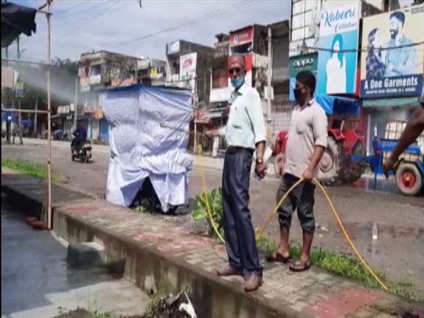Sanitisation work being carried out during Weekend lockdown in Khatima, Uttrakhand [Photo/ANI]