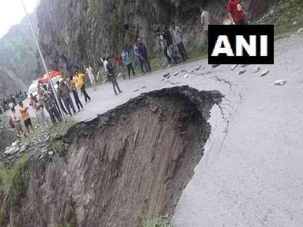 Buses got stuck in Chamba, Himachal Pradesh after a road got wahsed away following heavy downpour on Tuesday. (Photo/ANI)