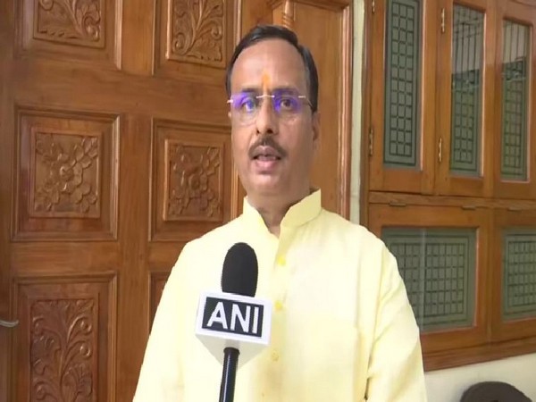 Uttar Pradesh Deputy Chief Minister Dinesh Sharma while speaking to ANI on Tuesday. (Photo/ANI)