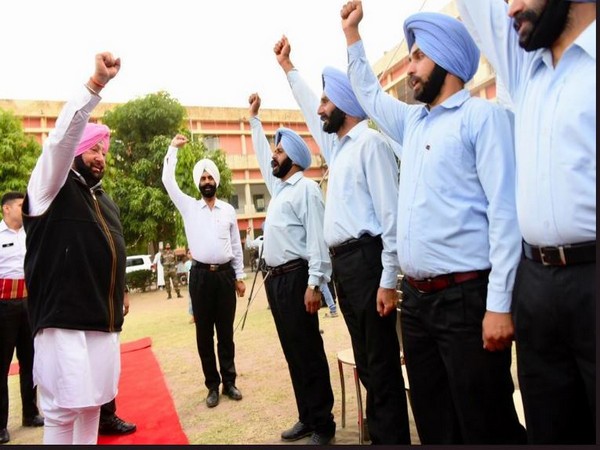 Punjab Chief Minister Captain Amarinder Singh with the Sikh Regiment staff on Saturday evening. Photo/ANI